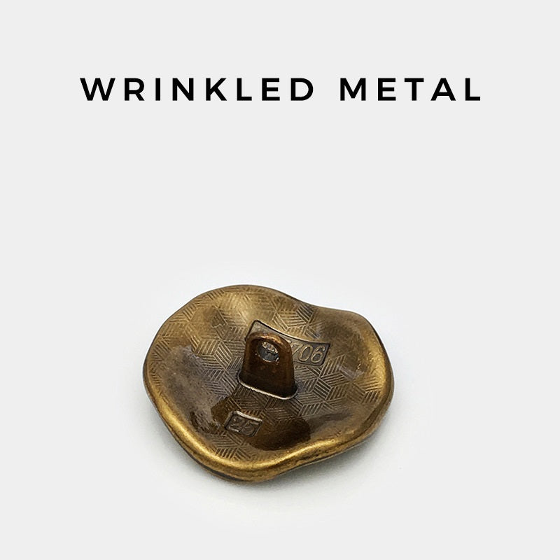 15-32mm antiikhõbedased volditud ebaregulaarse kujuga metallnööbid mantlitele 20 tk