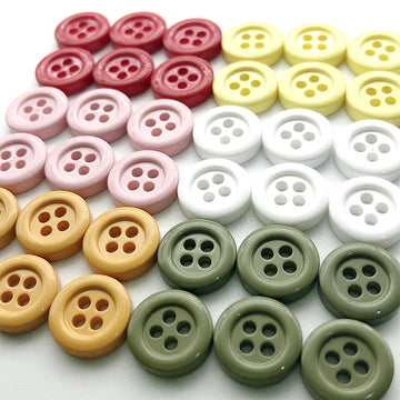 Botones redondos coloridos de 11.5 mm con cuatro agujeros para cárdigans de niños 100 piezas