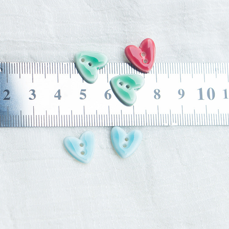 Bottoni in ceramica a forma di cuore 20mm con 2 fori per gioielli fai-da-te 10 pezzi
