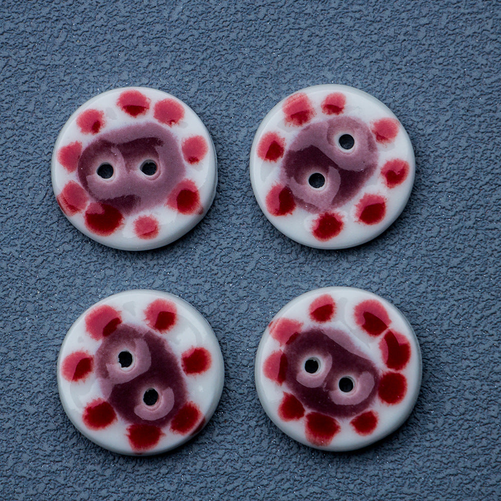19,5 mm-es piros pöttyös, 2 lyukú, kézzel készült kerámia gombok 10 db