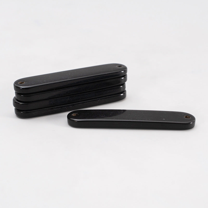 Pulsante a corno ovale nero da 45 mm con 2 fori 4 pezzi