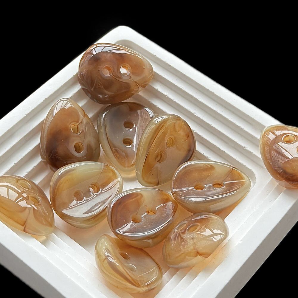 23x28mm Amber och Mjölkvit 3D Melonkärna Formade 2 Hål Harpiks Knappar 40st