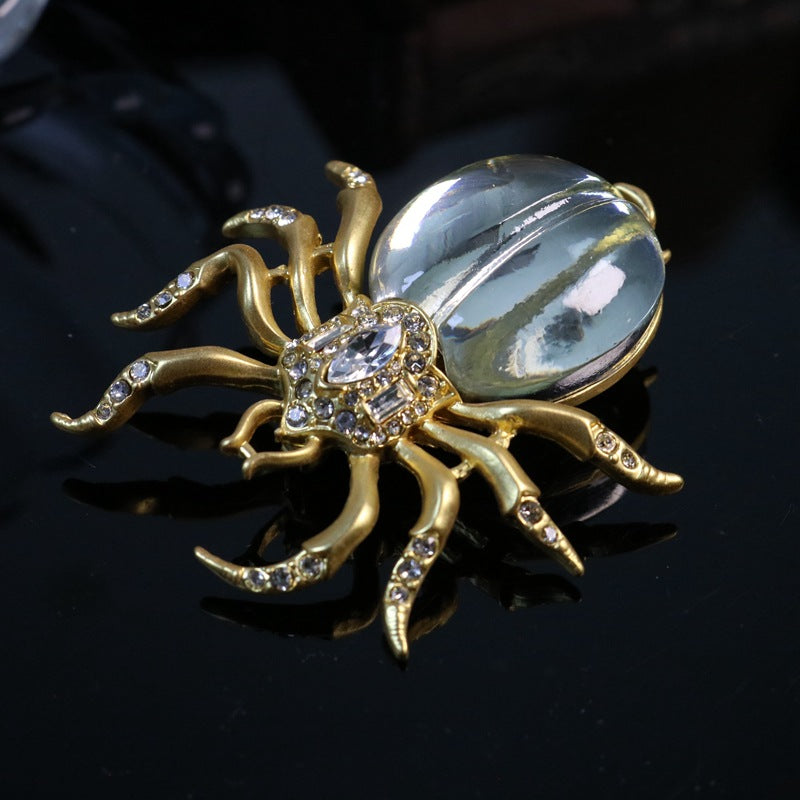 Spilla a forma di ragno incastonata di strass con placcatura in oro genuino