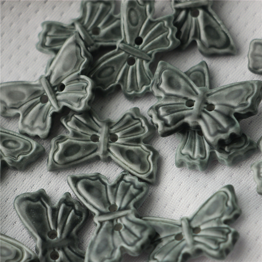 Bottoni in ceramica a forma di farfalla 25mm con 2 fori bianchi e grigio scuro per accessori per borse 6 pezzi