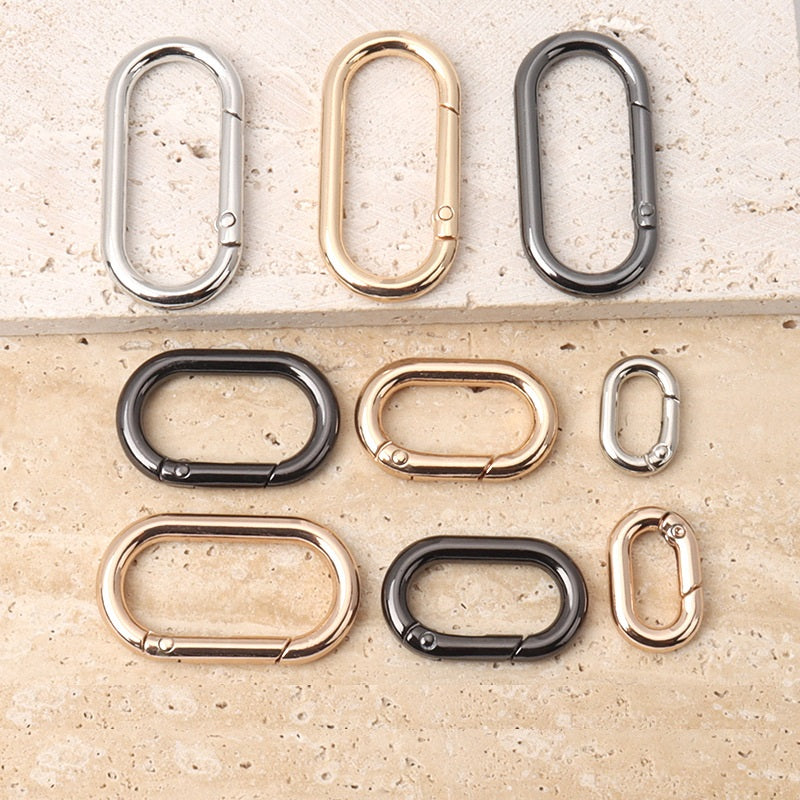 24 st blandade metall ovala krok ring fjäder spänne (14-40 mm)