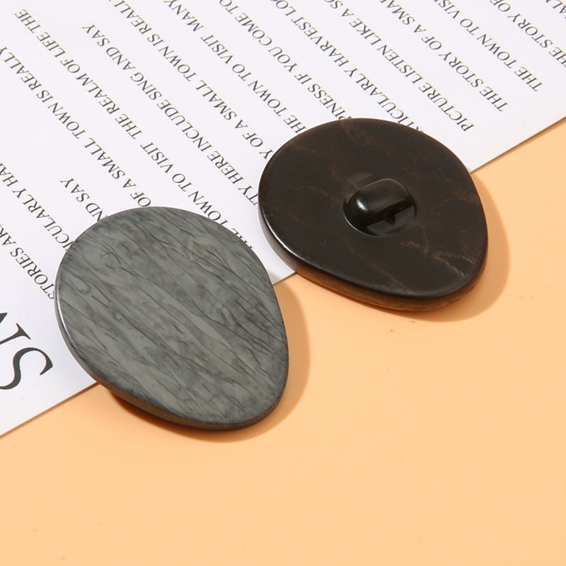 Ovala träådrade hartsstiftknappar 20-pack (19/24/27/33 mm)