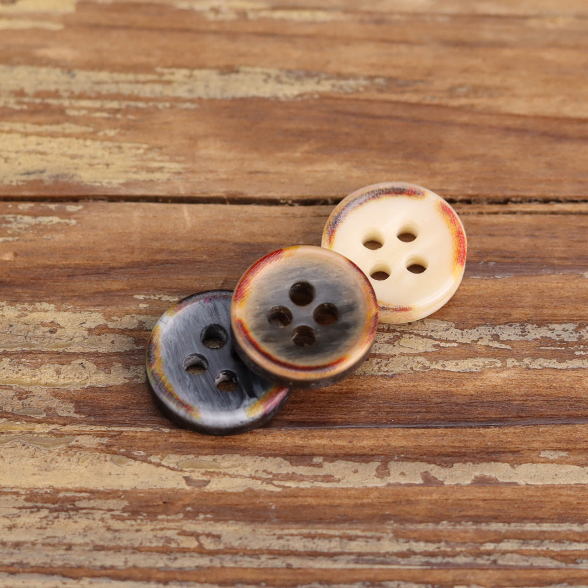 11,5 mm brandbrända skålformade resin skjortknappar 60-pack