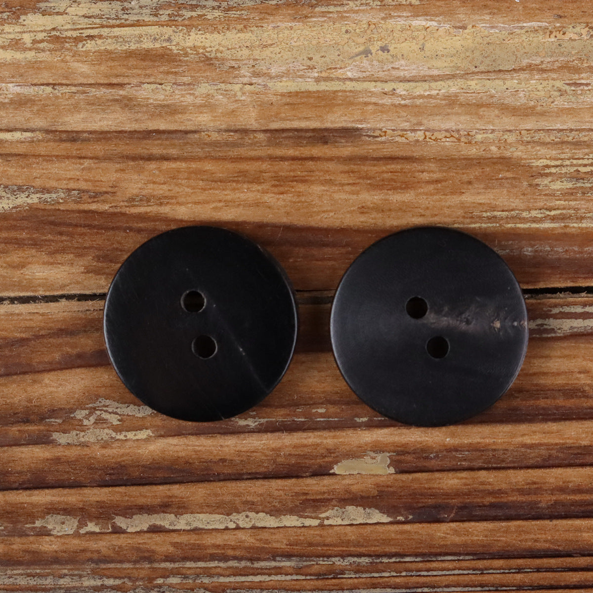 Round dark buffalo horn buttons set of two, each with two holes