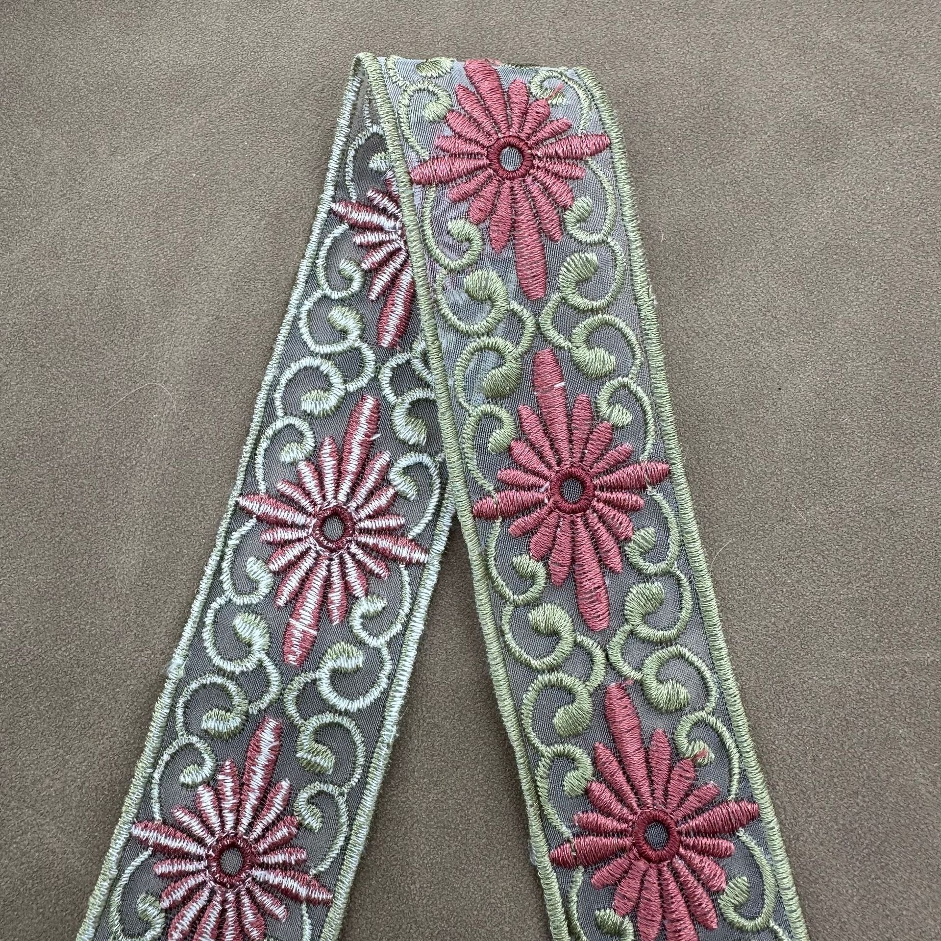 Organza lace trim with diamond embroidery, blue-gray fabric and magenta flower motifs