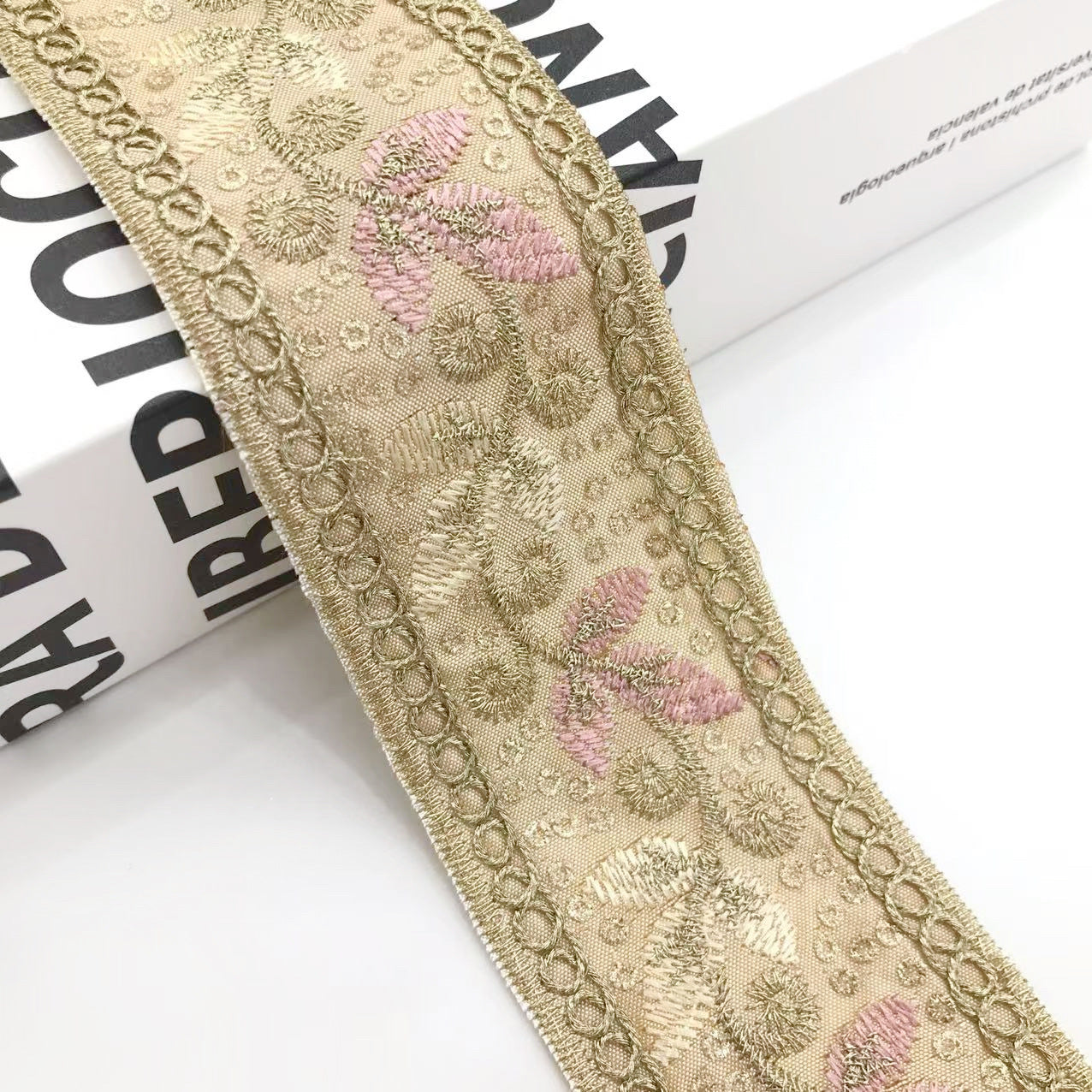 Gold sequin embroidered trim ribbon with floral scroll pattern and scalloped edge, 4.5cm