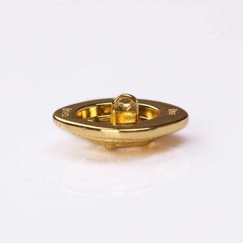 Gold rope-edge hollow heart metal shank button back view with central loop