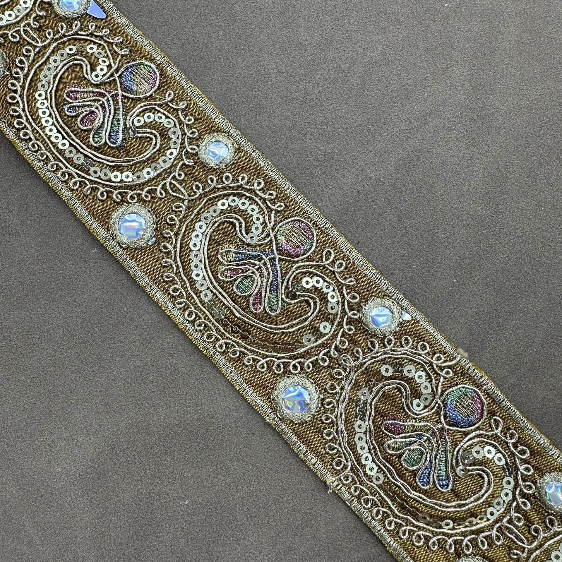 Gold-toned paisley embroidered trim with iridescent sequin dots and cord trim