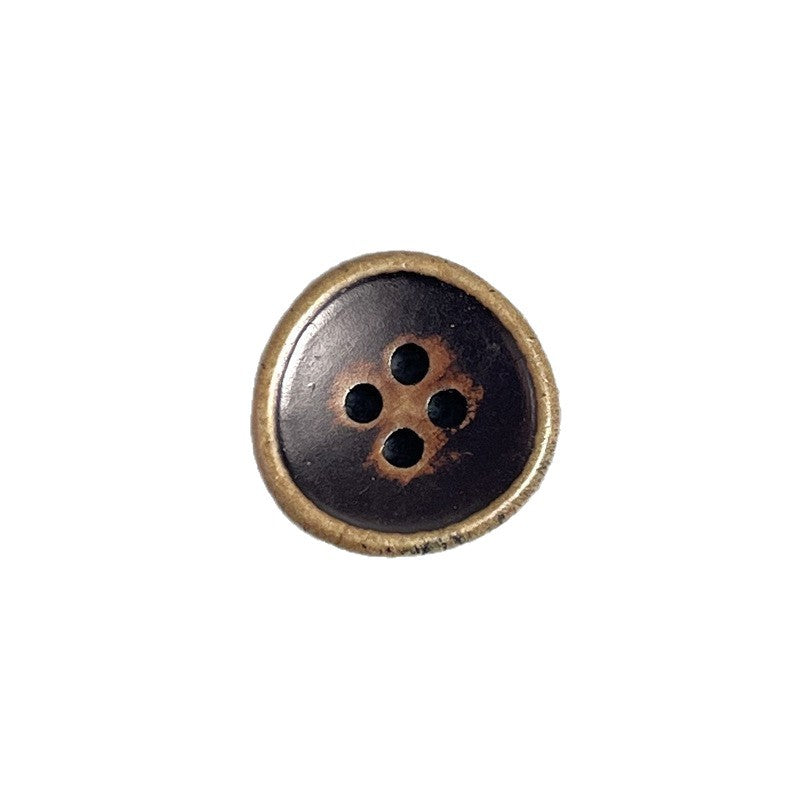 Four-hole wood button, brown face with dark inset and bronze edge.