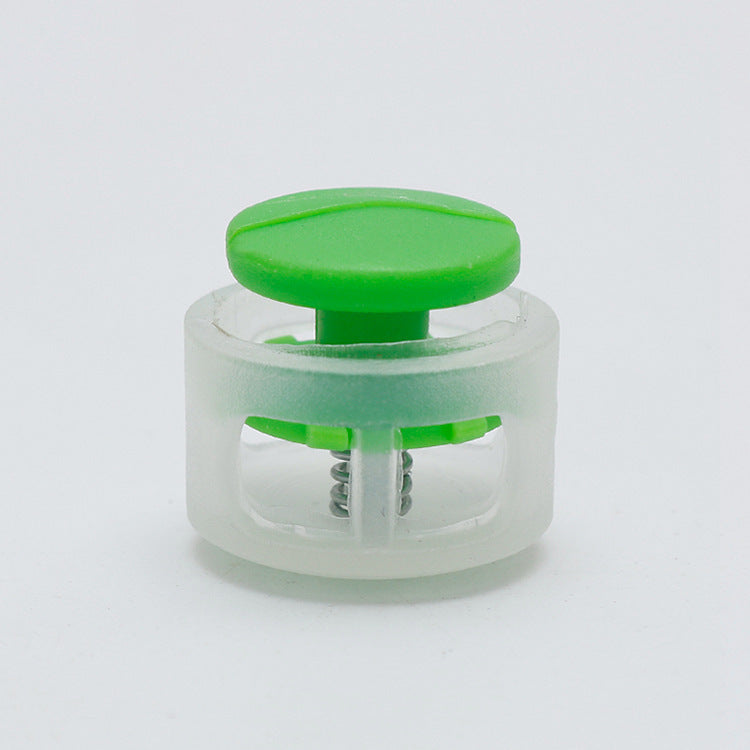 Plastic cord lock toggle with spring, neon green cap and clear body