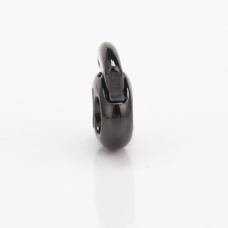 Gunmetal oval pig nose two-hole metal cord lock, side view of spring drawstring clip