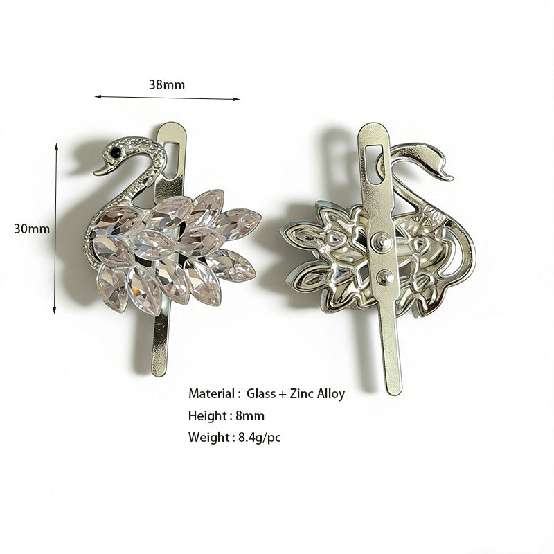 Clear rhinestone star/flower shoe buckle clip pair with winged shapes