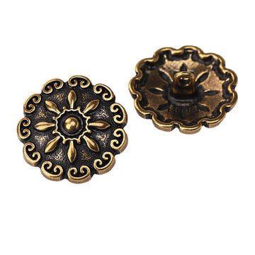 Antique gold domed floral metal shank button with decorative swirl edge