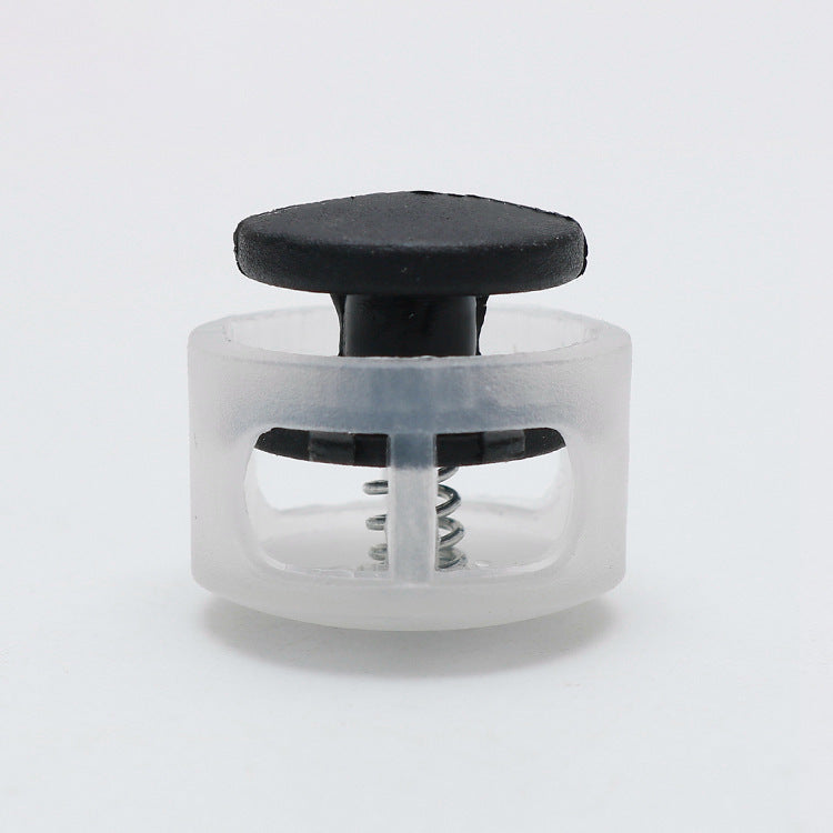 Plastic cord lock toggle with black round stopper in clear housing