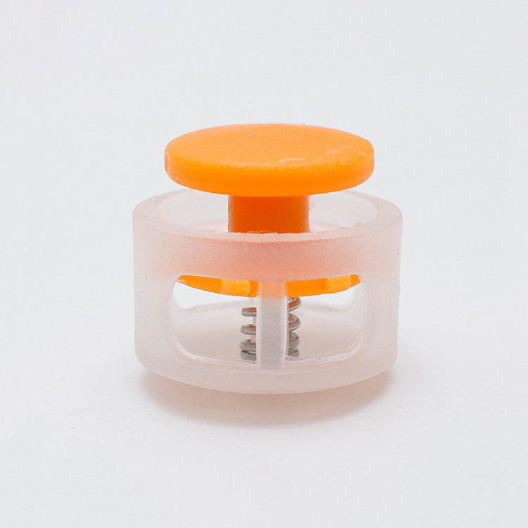 Plastic cord lock toggle with spring, orange cap and clear body