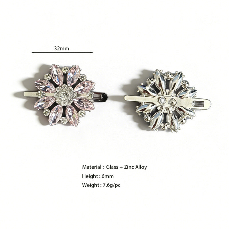 Pink and silver snowflake-style rhinestone shoe buckle clips with snap prongs