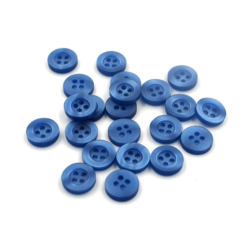 Bottoni da camicia rotondi a quattro fori blu cielo da 10 mm per uomini e donne 100 pezzi
