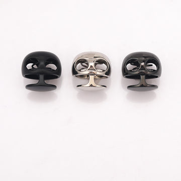 Ball-shaped metal spring toggle stopper set, glossy black and silver pair view