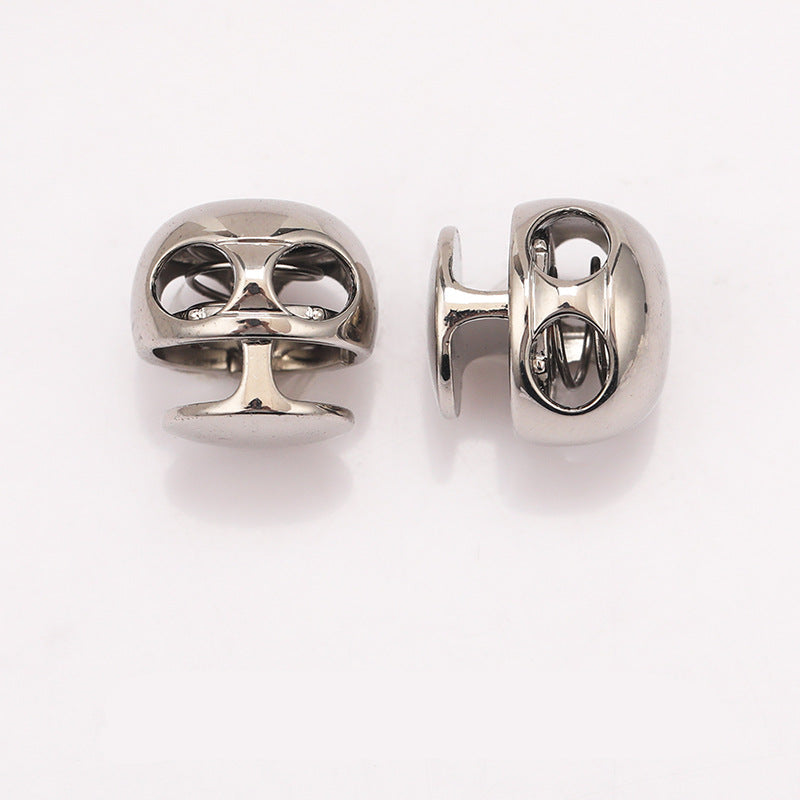 Silver-toned ball-shaped metal spring toggle stopper, front and back side angles