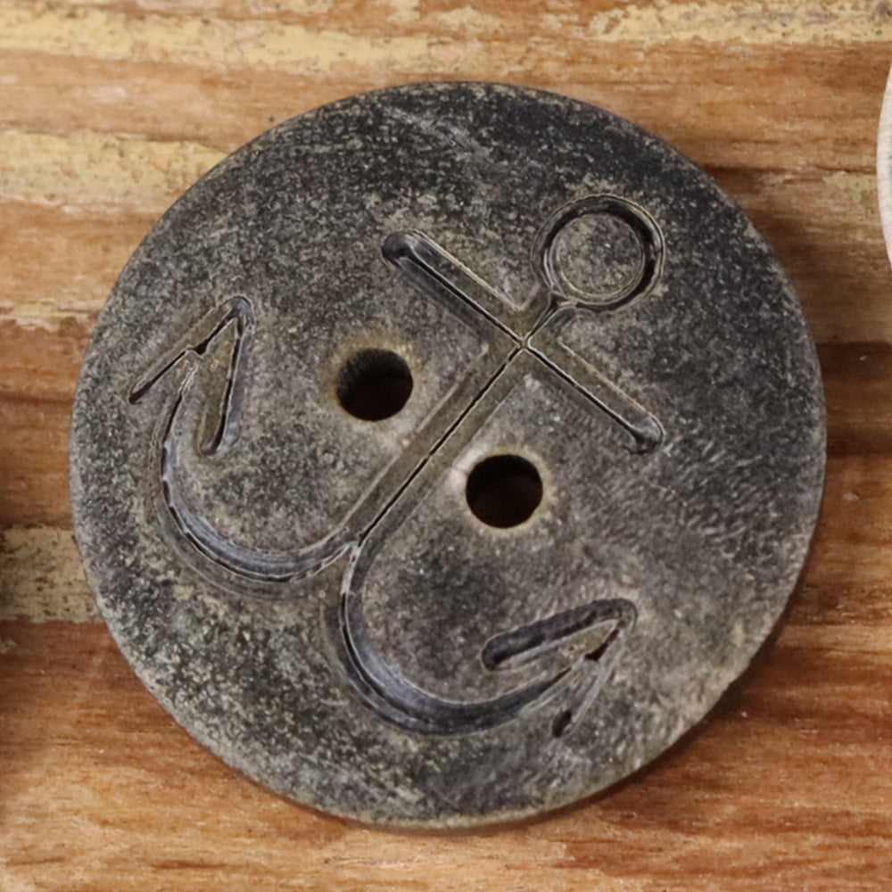 Anchor-shaped buffalo horn button, dark gray with four holes