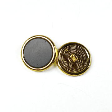 Round metal shank button set, black face with gold rim and engraved shank