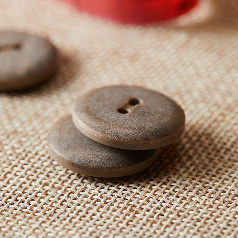Boutons ronds en éco-résine à deux trous de 24L/32L