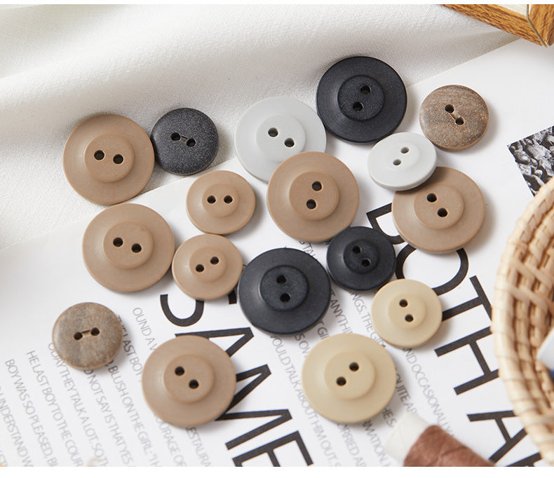 Boutons ronds en éco-résine à deux trous de 24L/32L