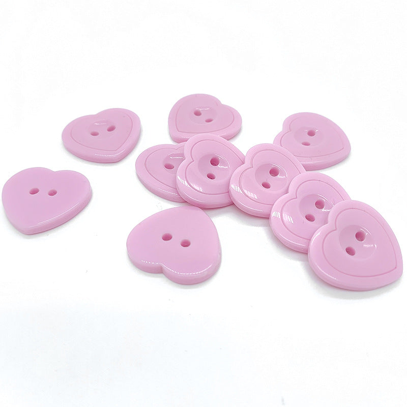 Botones de resina en forma de corazón de dos agujeros 36L rosa 60 piezas